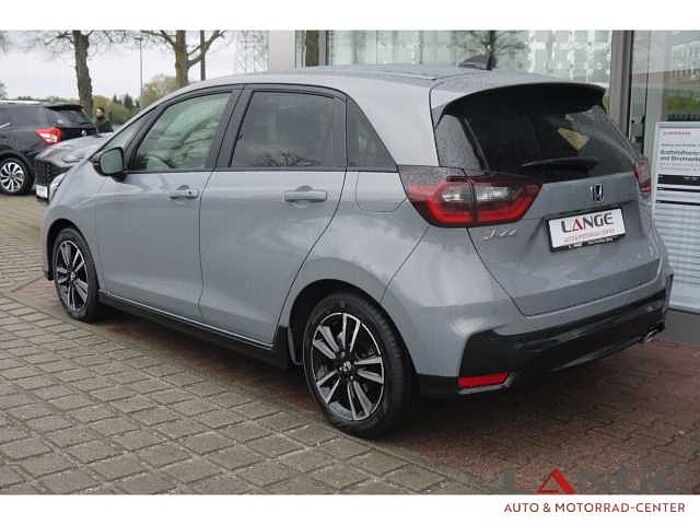 Honda Jazz 1.5 i-MMD Hybrid Advance Sport SHZ Temp Tel.-Vorb. PDC Regensensor Alu BT L 1.5 i-MMD Hybrid Advance Sport SHZ Temp Tel.-Vorb. PDC Regensensor Alu BT Lichts