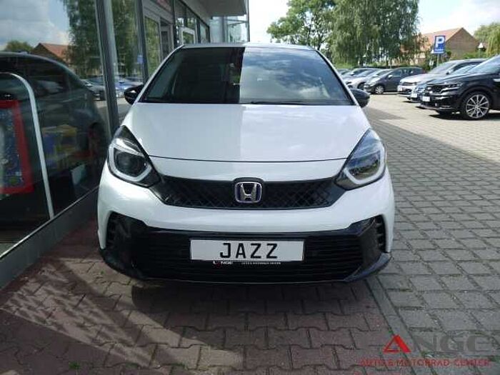 Honda Jazz 1.5 i-MMD Hybrid Advance Sport SHZ Temp Tel.-Vorb. PDC Regensensor Alu BT L 1.5 i-MMD Hybrid Advance Sport SHZ Temp Tel.-Vorb. PDC Regensensor Alu BT Lichts