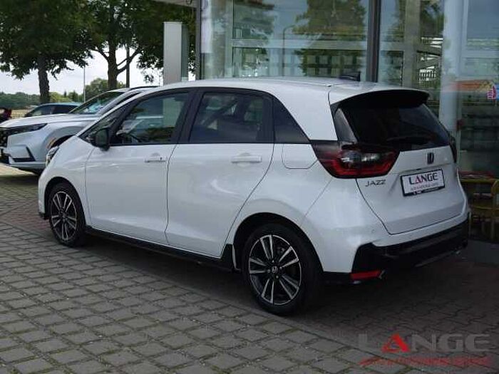Honda Jazz 1.5 i-MMD Hybrid Advance Sport SHZ Temp Tel.-Vorb. PDC Regensensor Alu BT L 1.5 i-MMD Hybrid Advance Sport SHZ Temp Tel.-Vorb. PDC Regensensor Alu BT Lichts